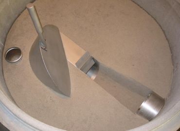 Flow regulators with a vortex effect
